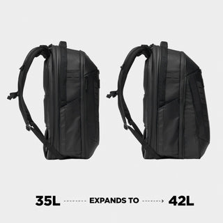 Two black backpacks shown side by side on a light gray background, with text below reading '35L EXPANDS TO 42L'. The image is a clean product presentation with no person or real environment.
