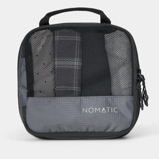 NOMATIC small Compression Packing Cube in gray, mesh top showing packed clothing