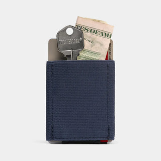 NOMATIC Wallet in navy with leather tab#color_navy-with-leather-tab