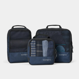 nomatic.mompression Packing Cubes in navy, set of three shown together