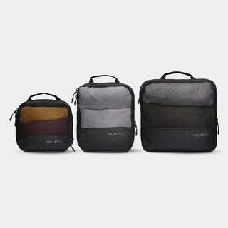 nomatic.mompression Packing Cubes in black, three sizes shown side by side