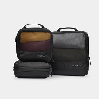 nomatic.mompression Packing Cubes in black, set of three shown together