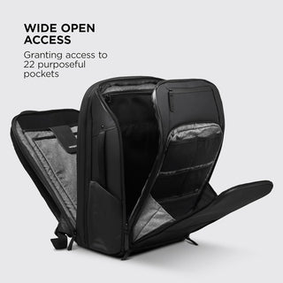 NOMATIC Travel Pack open clamshell showing 22 organized pockets